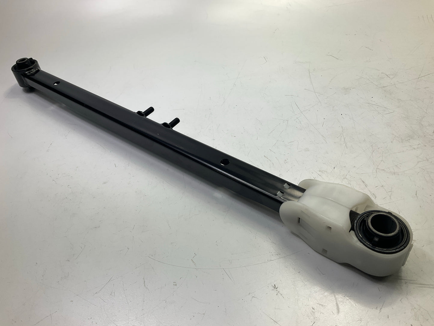 NEW UNBOXED - 102-6614 Rear Left Trailing Track Bar Arm 2001-03 Mazda Protege