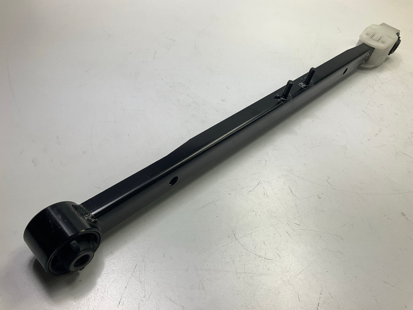 NEW UNBOXED - 102-6614 Rear Left Trailing Track Bar Arm 2001-03 Mazda Protege