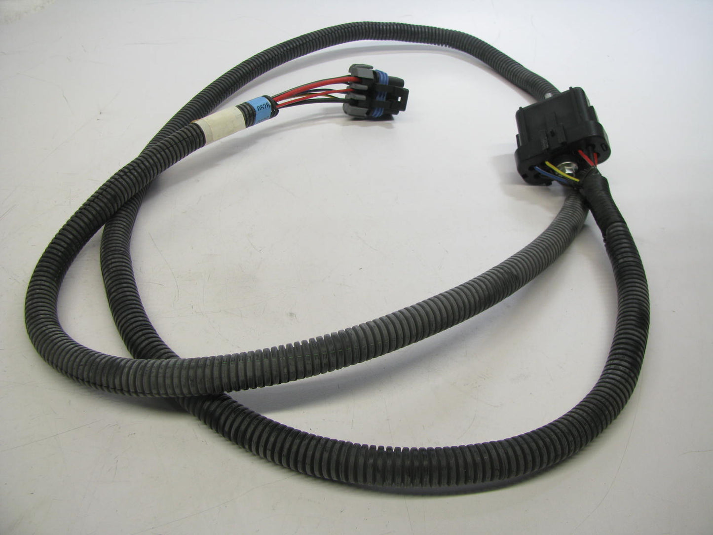 NEW - OUT OF BOX GM 12100526 Capsule Head Lamp Light Wiring Harness