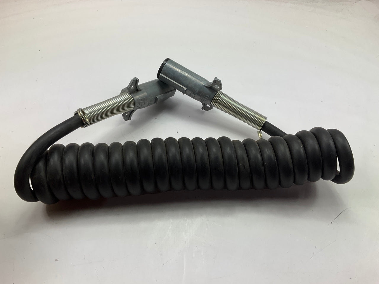 Pollak 15-112 12' Black Standard Duty Power Coiled Cable With Spring Guard