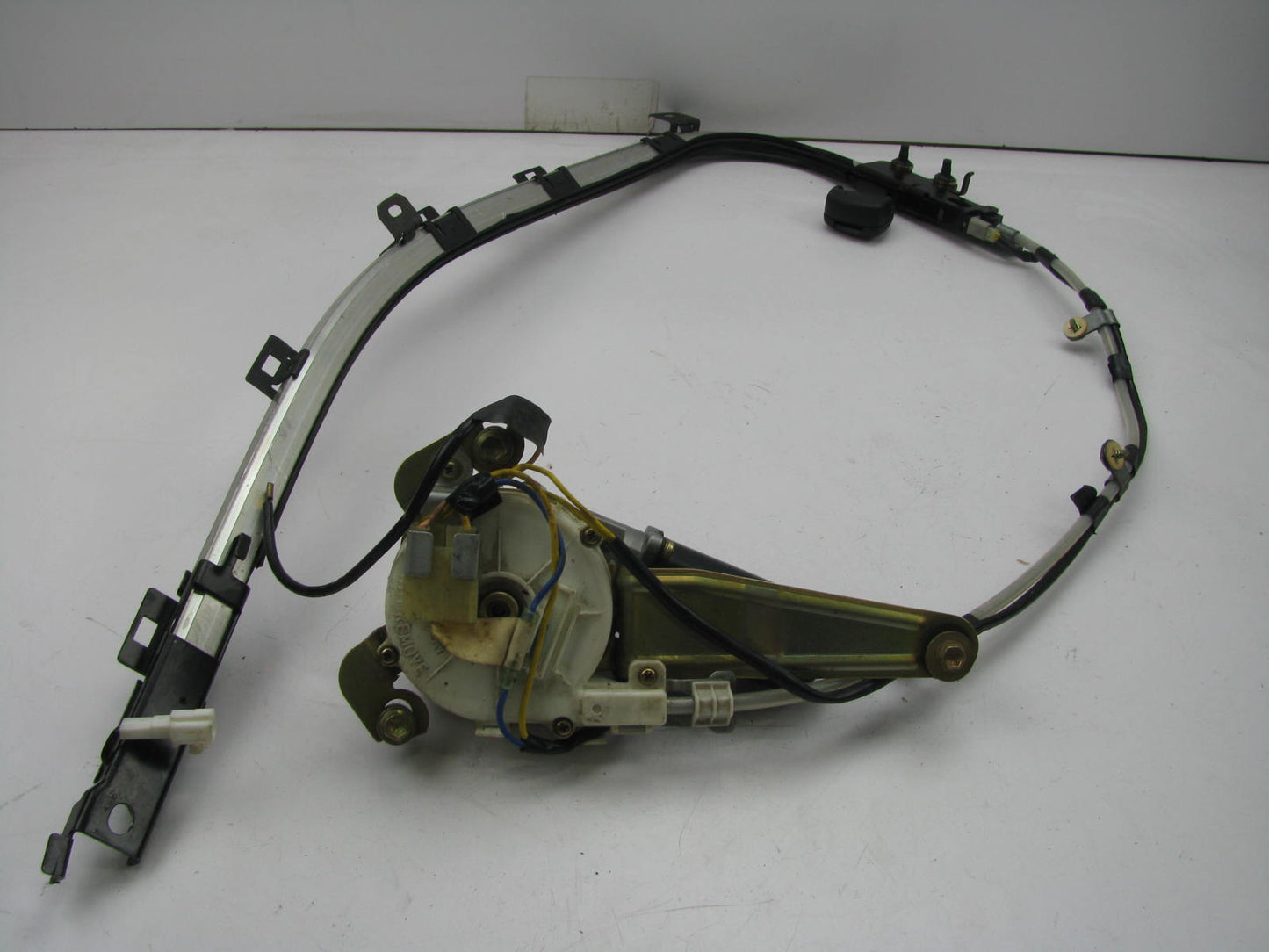 NEW - Out Of Box 162000-2221 Front Left Seat Belt Track & Motor 1991-96 Escort