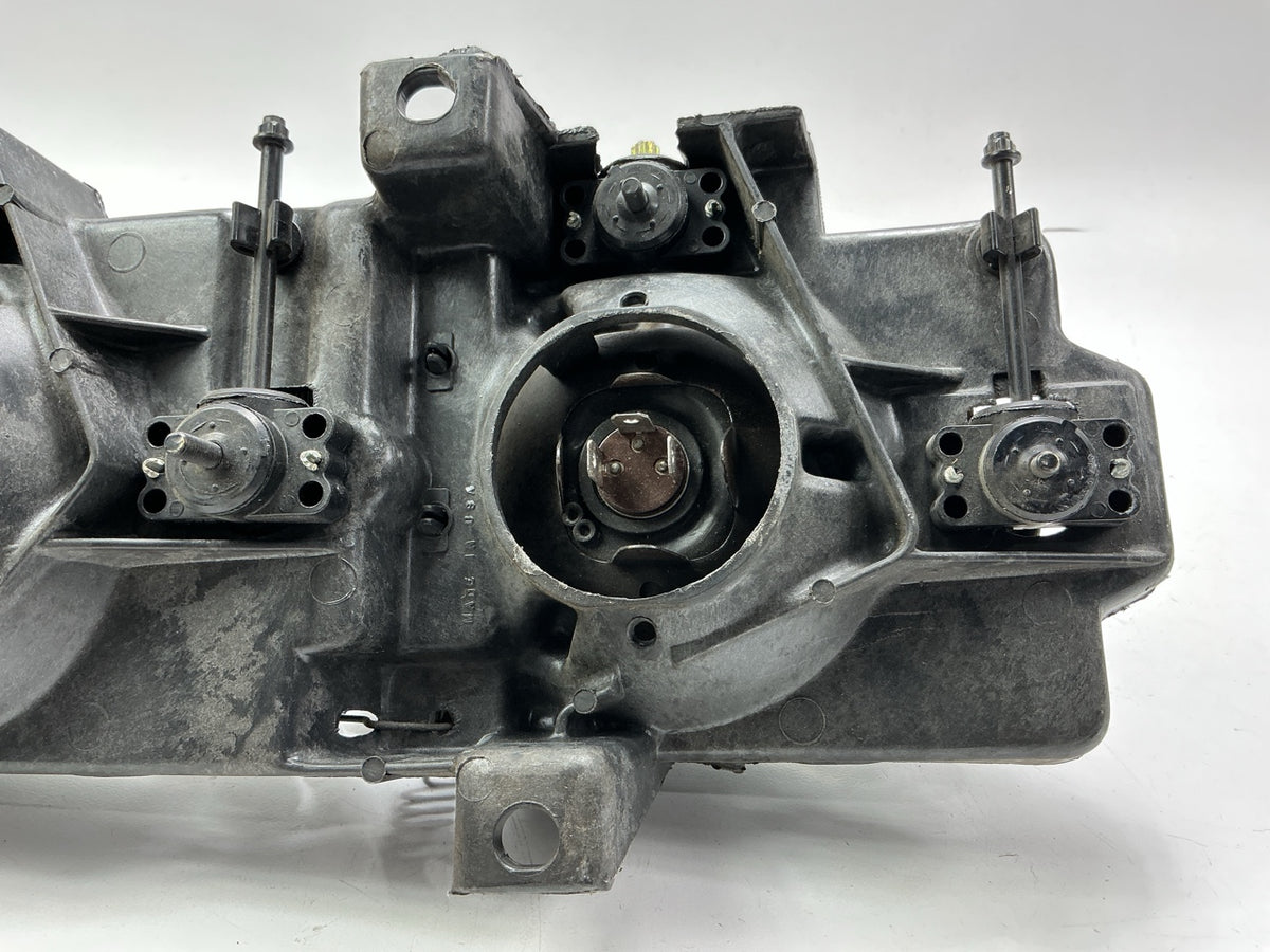 Damaged, See Photos - OEM GM 16506927 Left Headlight Housing With Both Headlamps