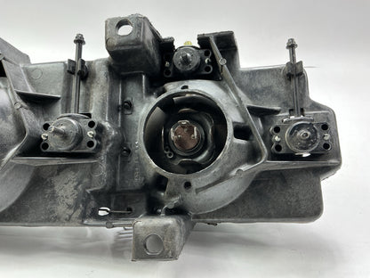 Damaged, See Photos - OEM GM 16506927 Left Headlight Housing With Both Headlamps