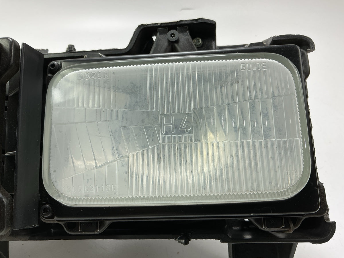 Used Good OEM GM 16506927 Left Headlamp W/ Bracket & Bulbs 1988-1989 C/K Trucks