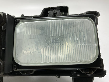 Used Good OEM GM 16506927 Left Headlamp W/ Bracket & Bulbs 1988-1989 C/K Trucks
