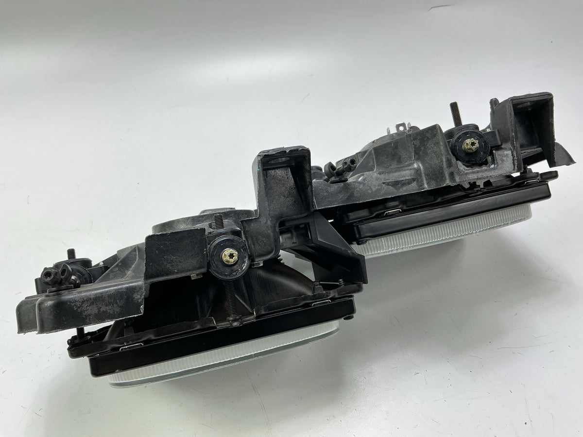 Used Good OEM GM 16506927 Left Headlamp W/ Bracket & Bulbs 1988-1989 C/K Trucks