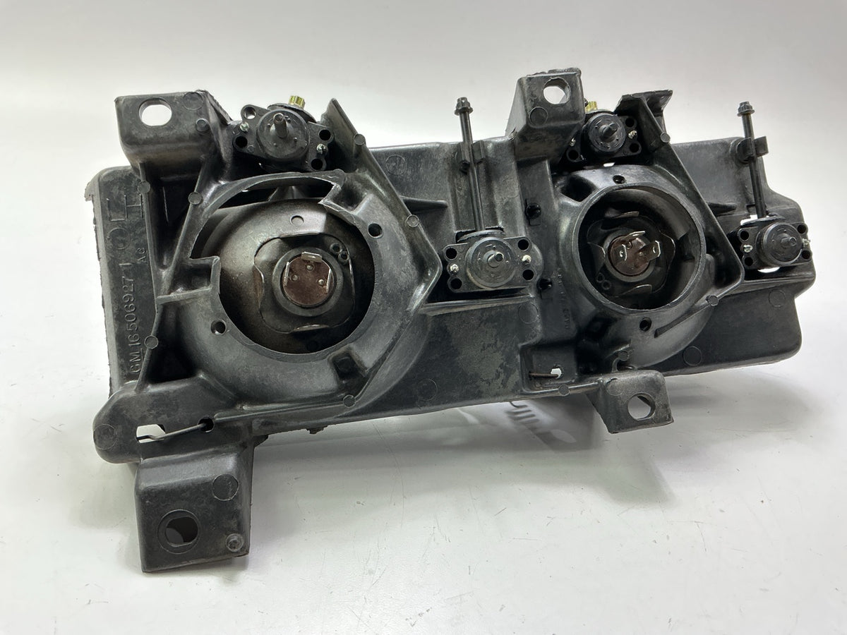 Used Good OEM GM 16506927 Left Headlamp W/ Bracket & Bulbs 1988-1989 C/K Trucks
