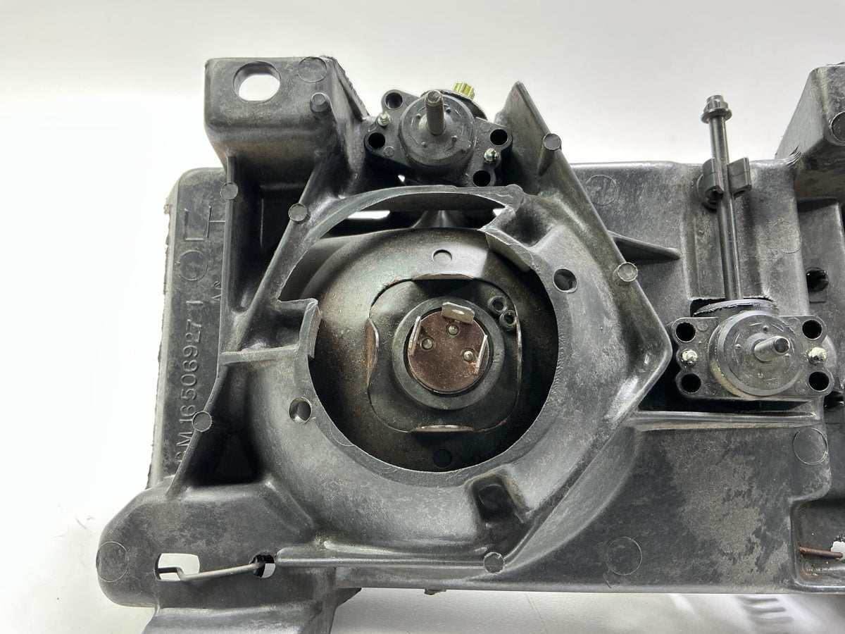 Used Good OEM GM 16506927 Left Headlamp W/ Bracket & Bulbs 1988-1989 C/K Trucks