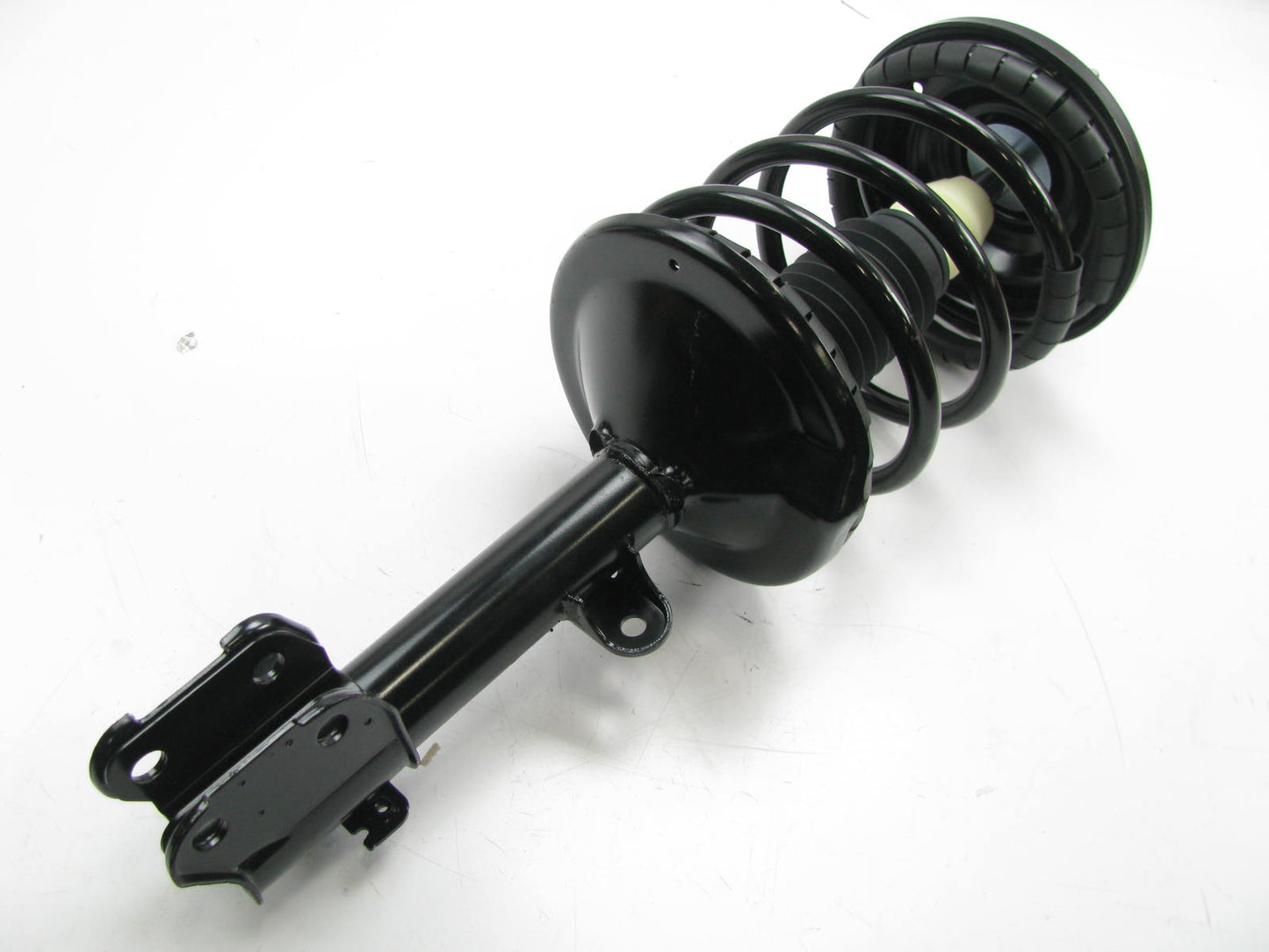 NEW - OUT OF BOX 171452 Suspension Strut And Coil Spring Assembly - Front Left