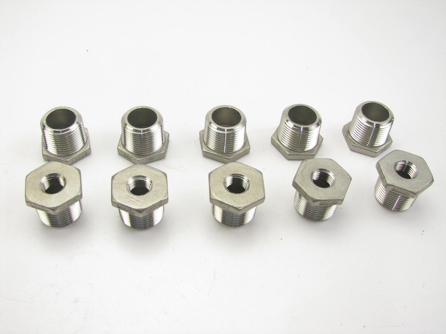 (10) Hex Reducing Bushing: 316 Stainless Steel, 3/4'' Male NPT X 1/4'' Female NPT
