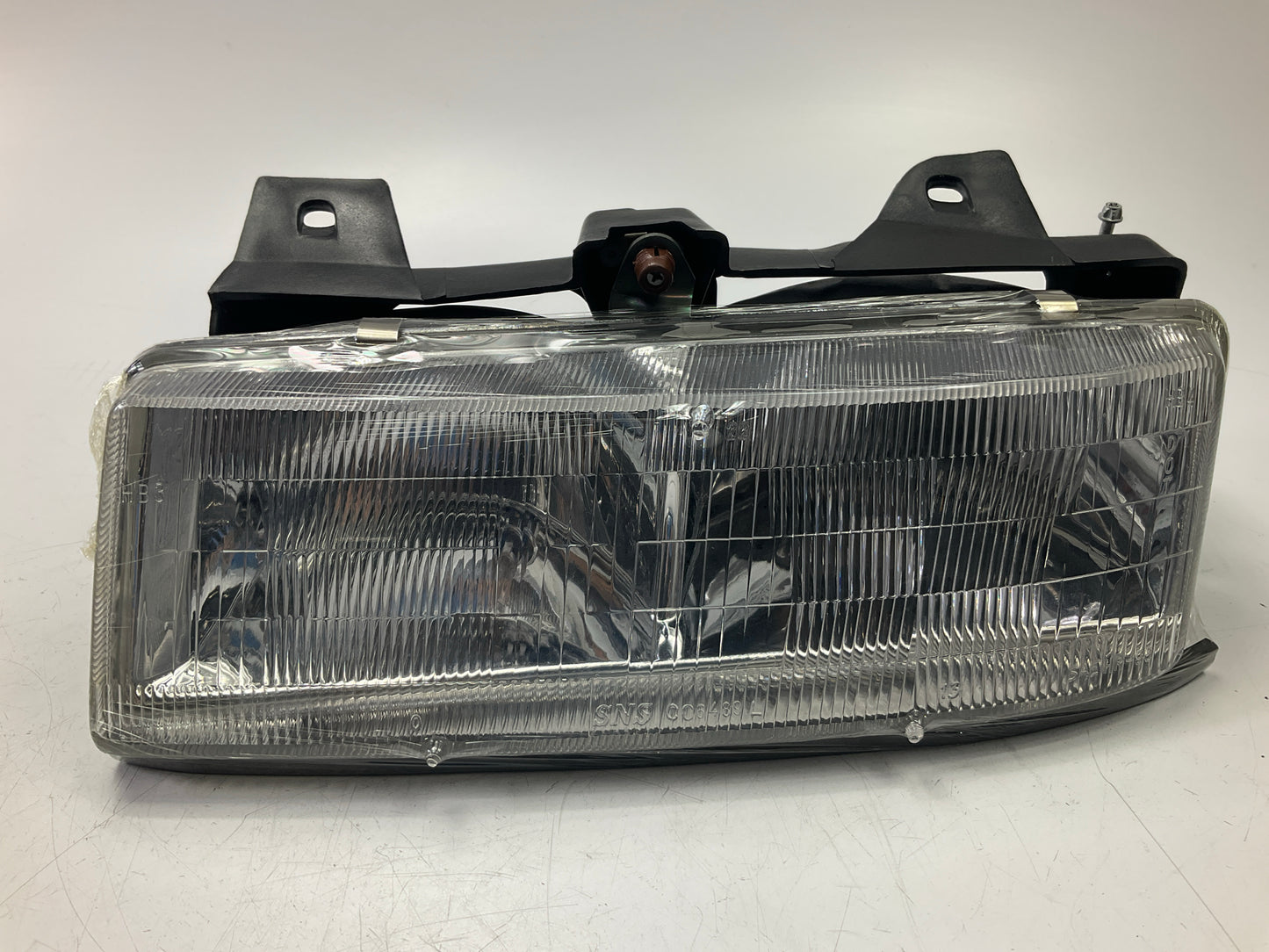 NEW Aftermarket 1990-1996 Chevy Corsica Left Headlight Head Lamp 20-1679-00