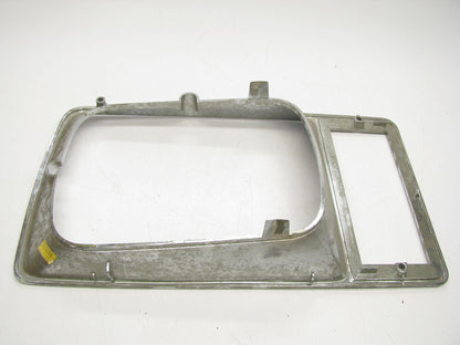 USED - GM 25500237 LH Headlight Bezel Door Surround Trim 1982-1985 Buick Skylark