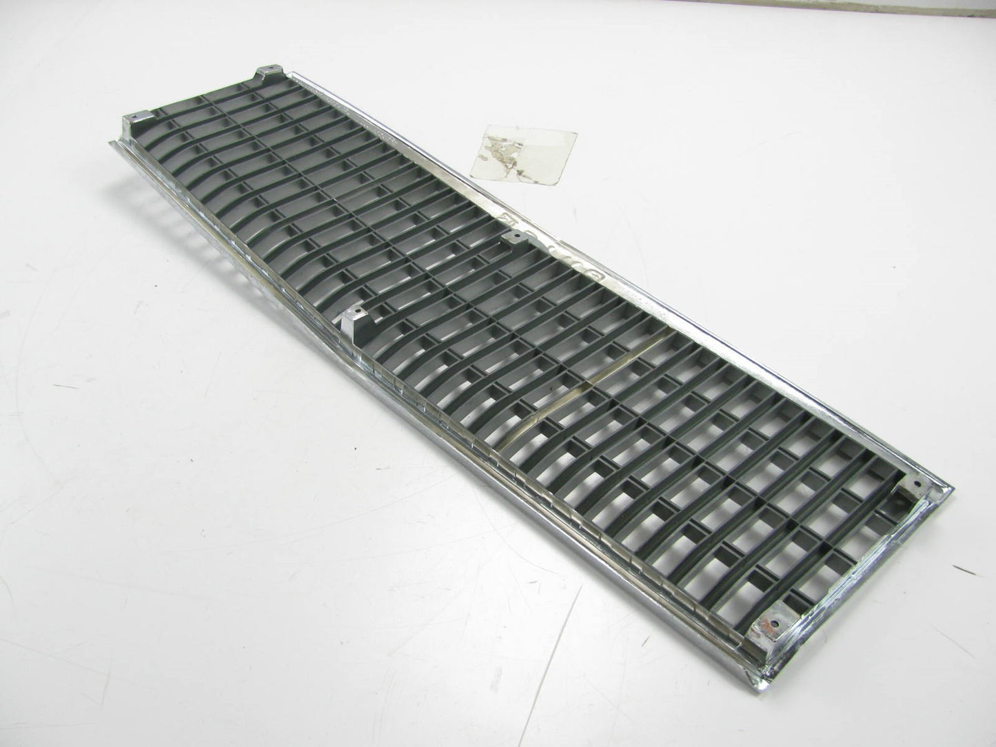 NEW - OUT OF BOX - OEM GM Front Grille 1982-1985 Buick Skylark (SOME TARNISHING)