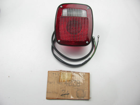NEW - UNBOXED 4028 Combination Stop, Tail, Turn, Back-up Lamp For Ford & Dodge