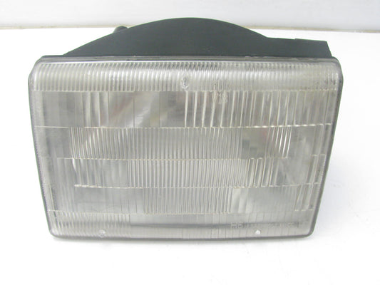 NEW - OUT OF BOX OEM 55055127 LEFT Headlight Headlamp For 1994-96 Grand Cherokee