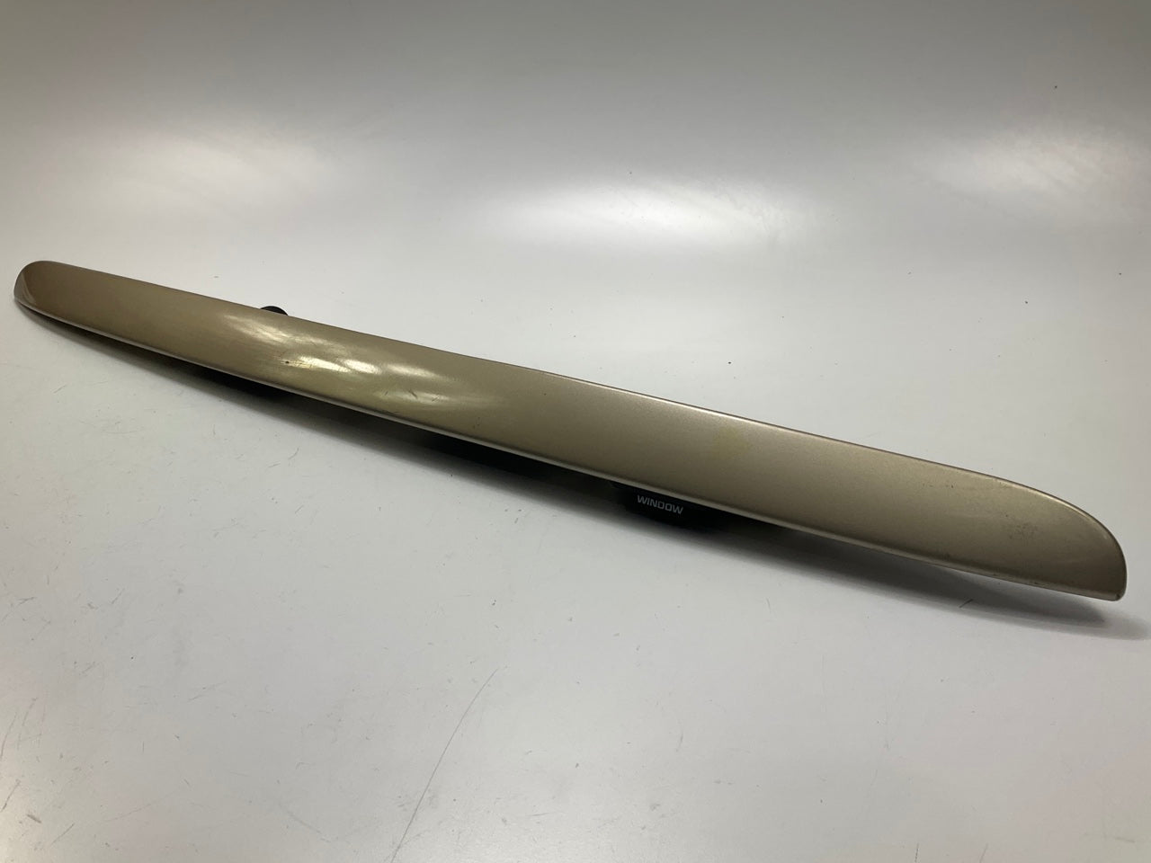 USED - 55155134AD Lift Gate License Plate Trim Champagne 99-04 Grand Cheroke