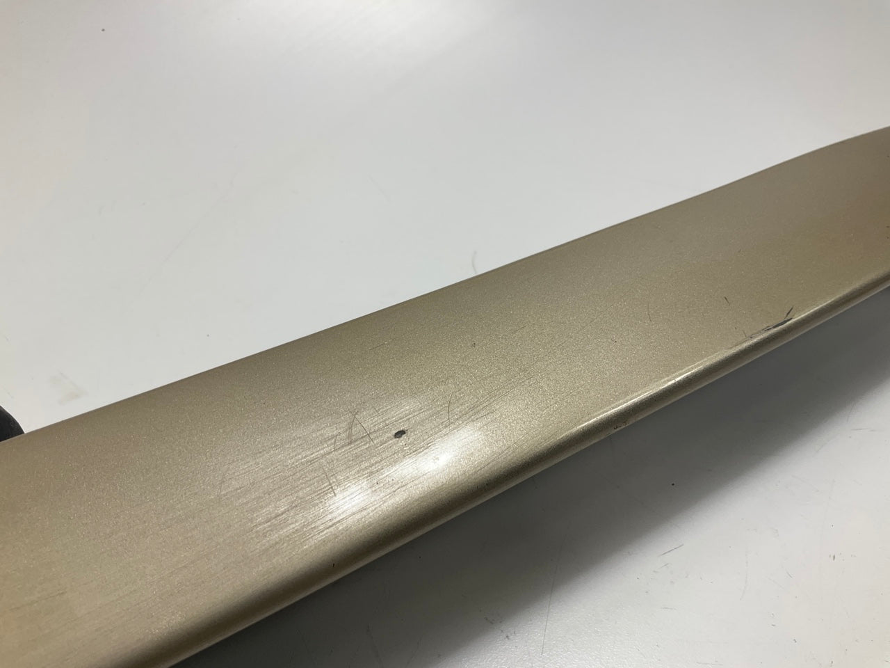 USED - 55155134AD Lift Gate License Plate Trim Champagne 99-04 Grand Cheroke
