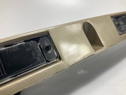 USED - 55155134AD Lift Gate License Plate Trim Champagne 99-04 Grand Cheroke