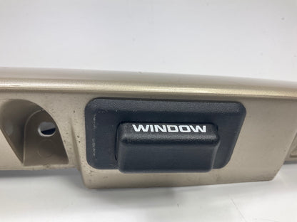 USED - 55155134AD Lift Gate License Plate Trim Champagne 99-04 Grand Cheroke