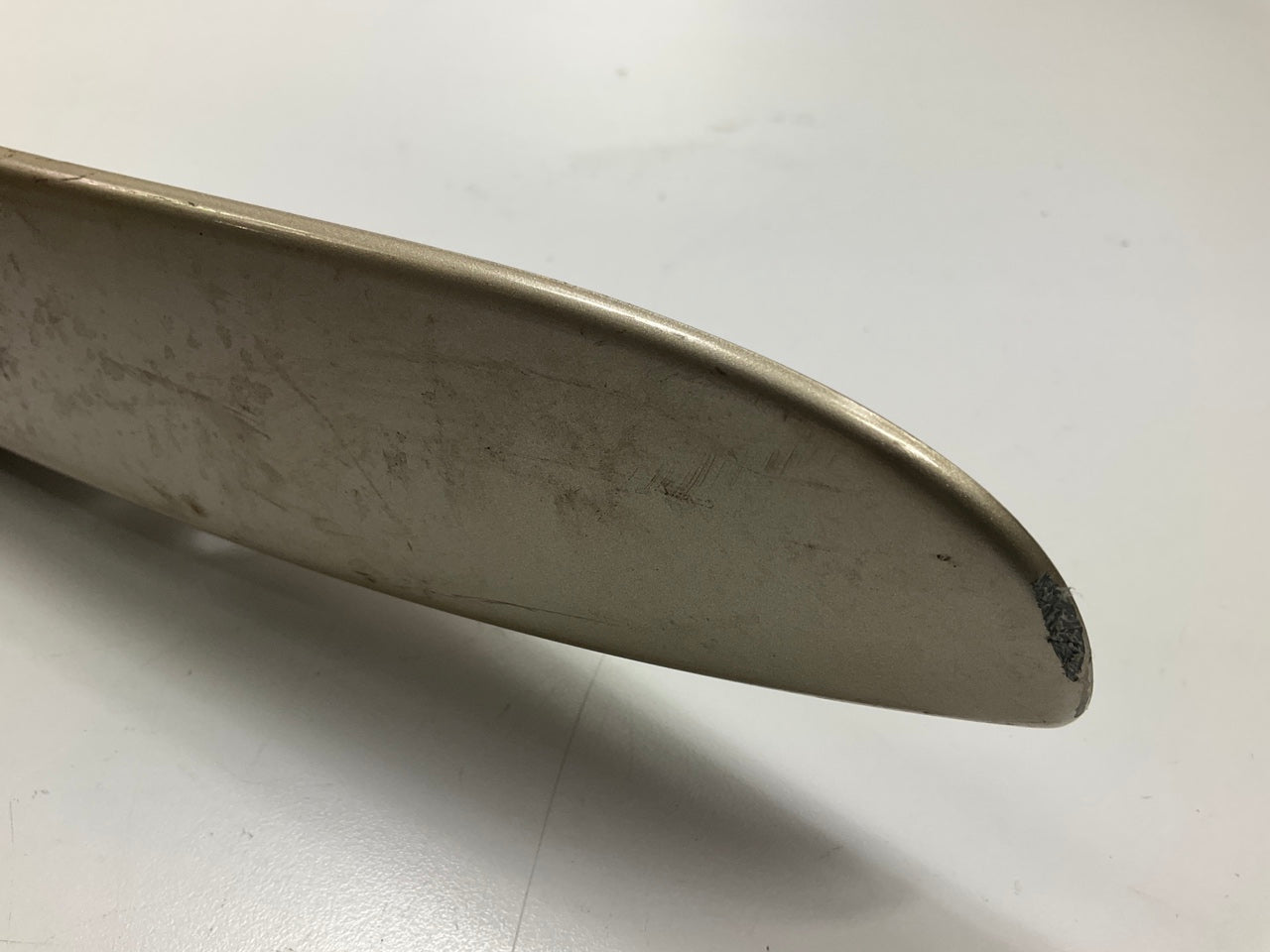USED - 55155134AD Lift Gate License Plate Trim Champagne 99-04 Grand Cheroke