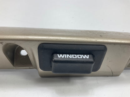 USED - 55155134AD Lift Gate License Plate Trim Champagne 99-04 Grand Cheroke