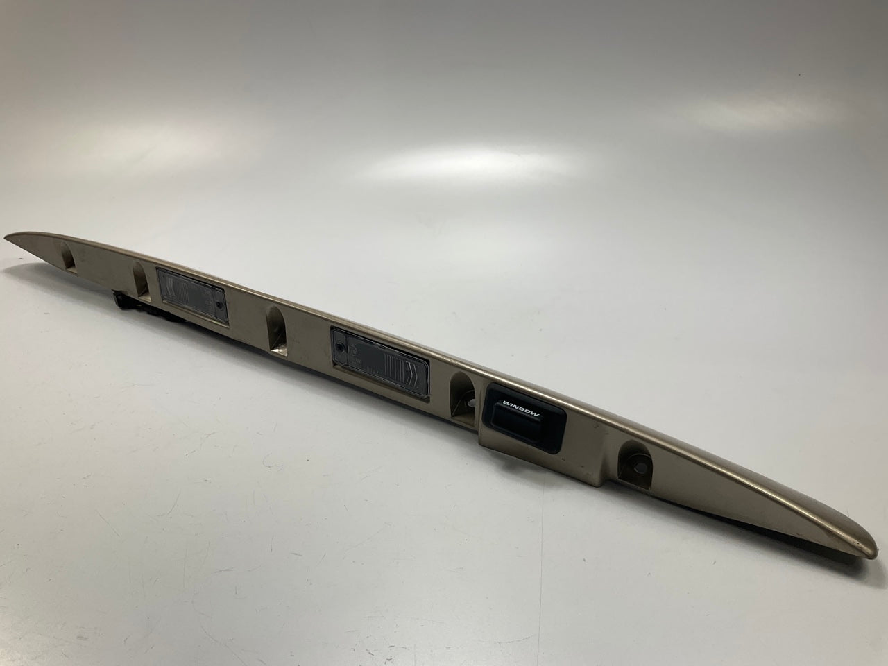 USED - 55155134AD Lift Gate License Plate Trim Champagne 99-04 Grand Cheroke