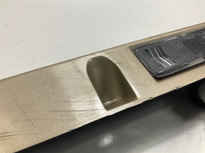 USED - 55155134AD Lift Gate License Plate Trim Champagne 99-04 Grand Cheroke