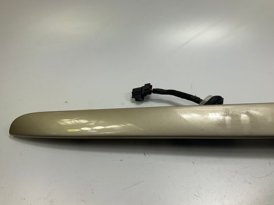 USED - 55155134AD Lift Gate License Plate Trim Champagne 99-04 Grand Cheroke