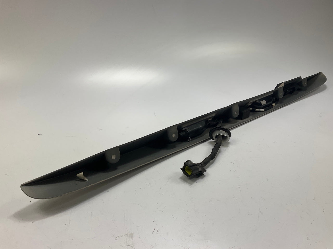 USED - 55155134AD Lift Gate License Plate Trim Champagne 99-04 Grand Cheroke