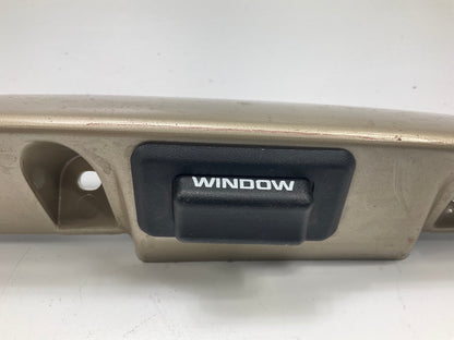 USED - 55155134AD Lift Gate License Plate Trim Champagne 99-04 Grand Cheroke