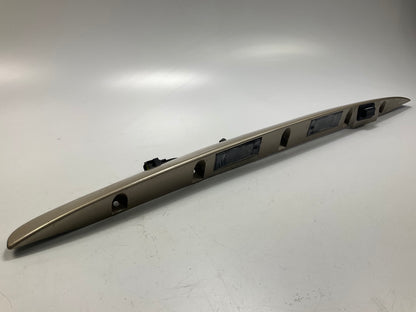 USED - 55155134AD Lift Gate License Plate Trim Champagne 99-04 Grand Cheroke