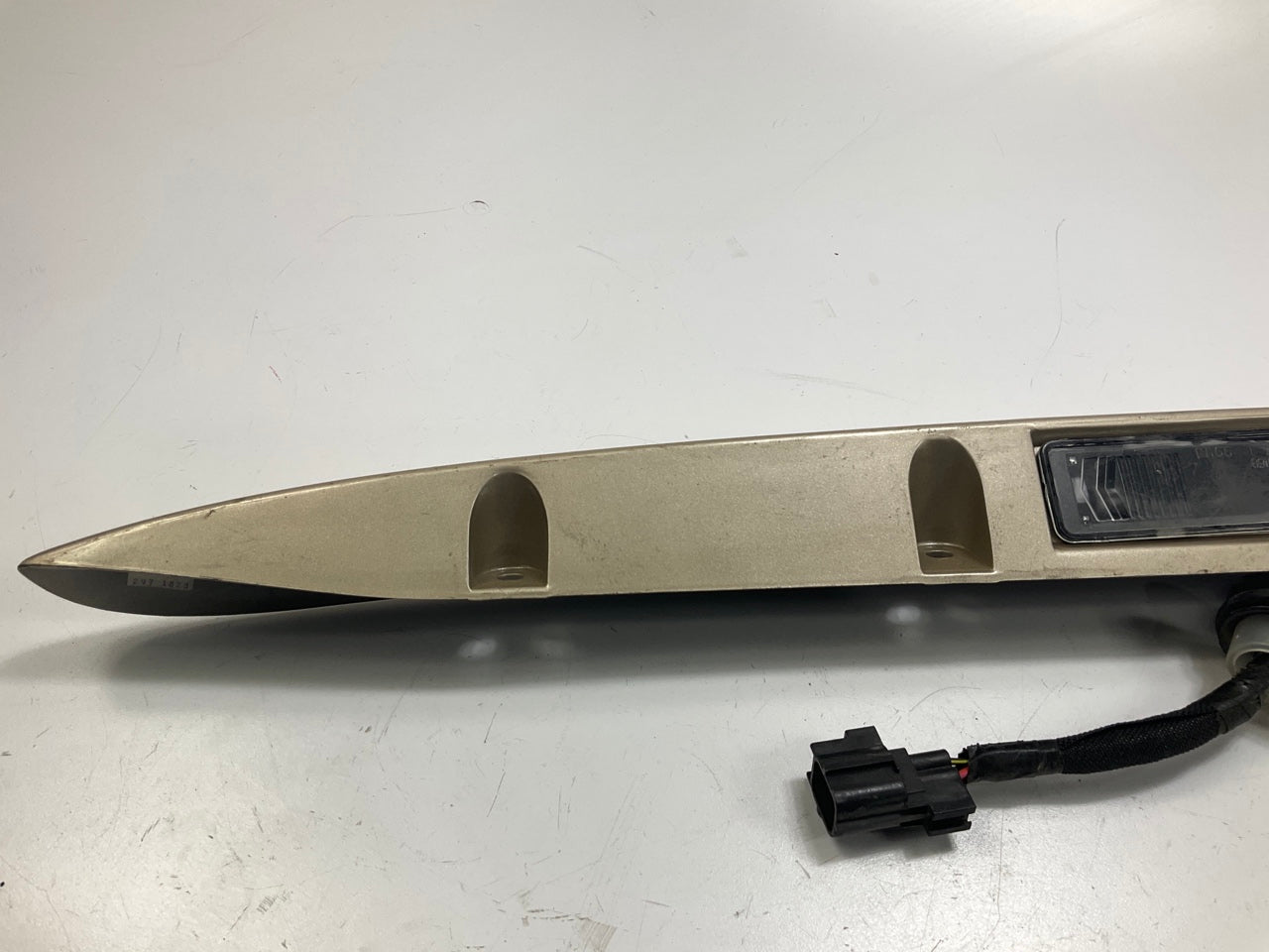 USED - 55155134AD Lift Gate License Plate Trim Champagne 99-04 Grand Cheroke