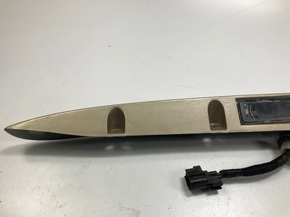 USED - 55155134AD Lift Gate License Plate Trim Champagne 99-04 Grand Cheroke