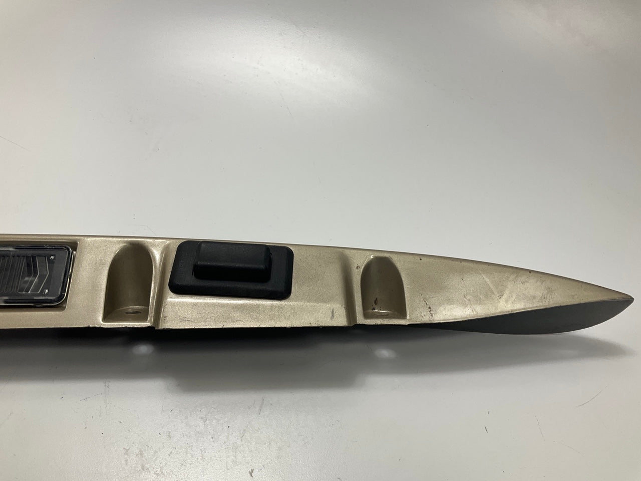 USED - 55155134AD Lift Gate License Plate Trim Champagne 99-04 Grand Cheroke