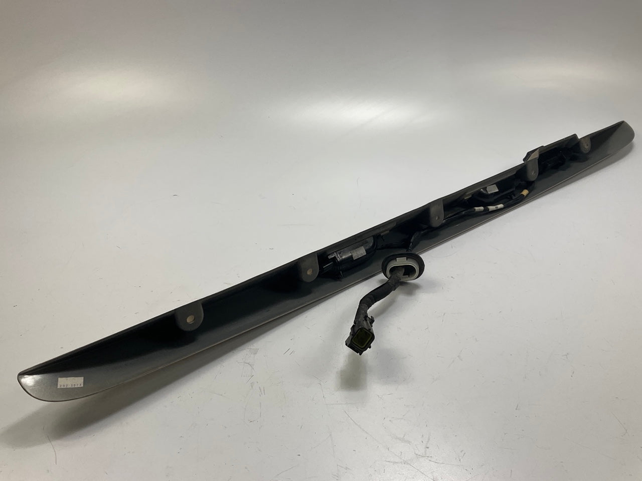 USED - 55155134AD Lift Gate License Plate Trim Champagne 99-04 Grand Cheroke