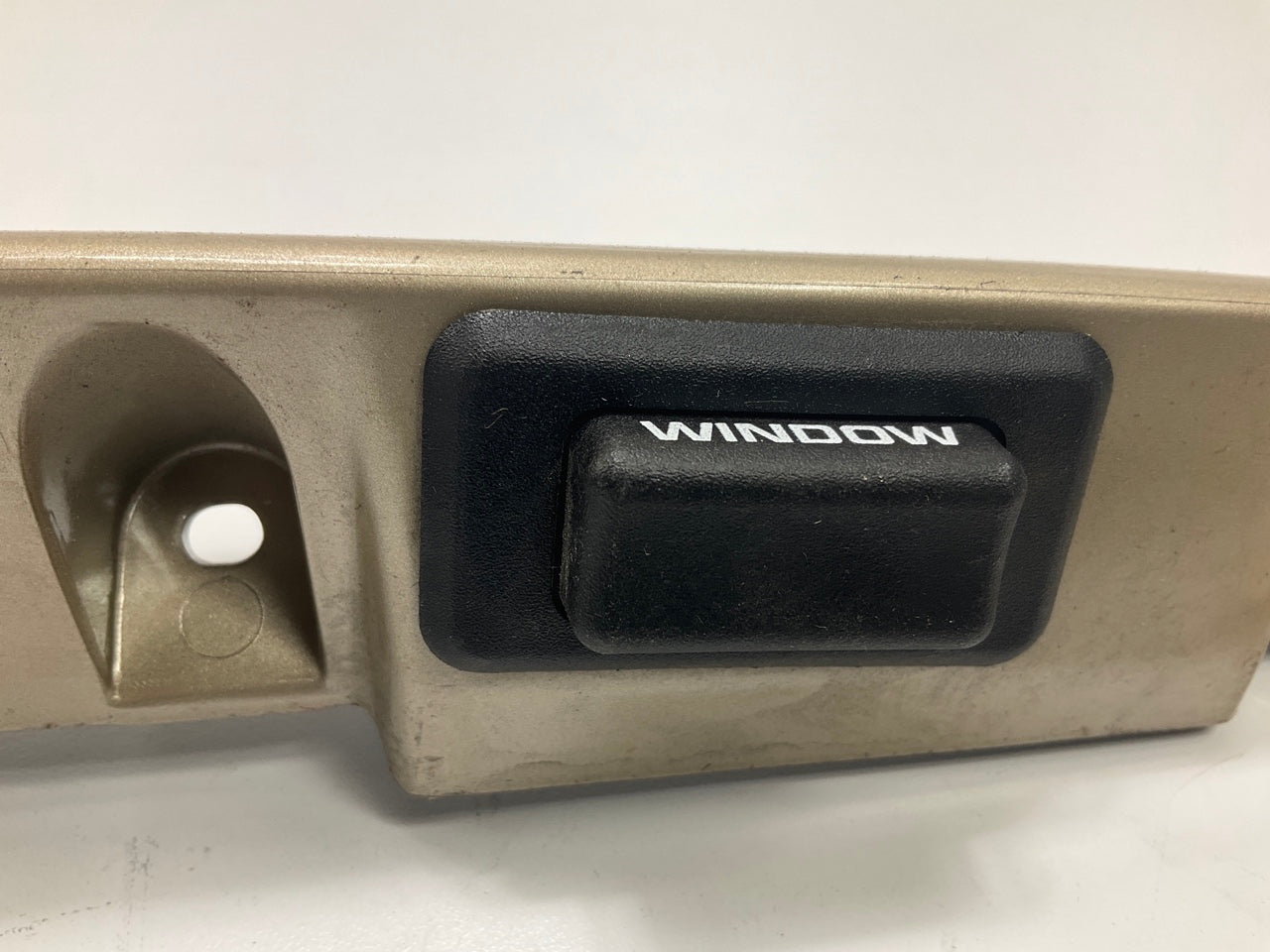 USED - 55155134AD Lift Gate License Plate Trim Champagne 99-04 Grand Cheroke