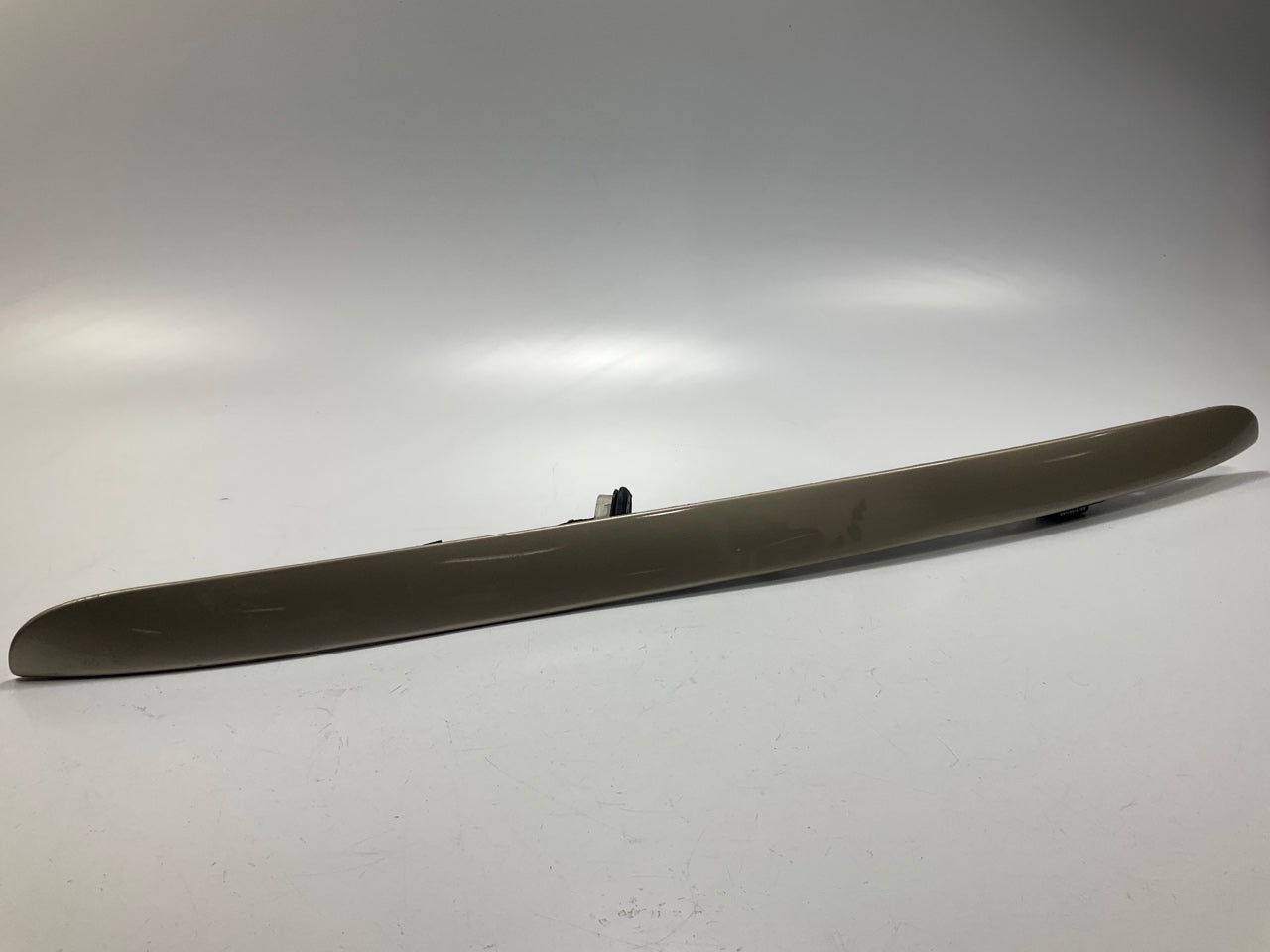 USED - 55155134AD Lift Gate License Plate Trim Champagne 99-04 Grand Cheroke