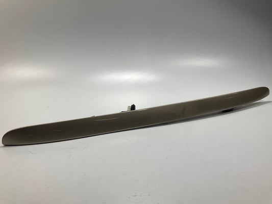 USED - 55155134AD Lift Gate License Plate Trim Champagne 99-04 Grand Cheroke