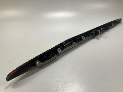 USED - 55155134AD Lift Gate License Plate Trim Champagne 99-04 Grand Cheroke