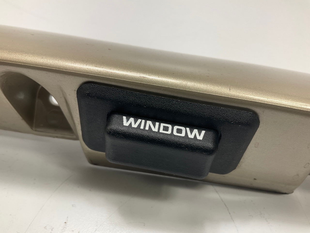 USED - 55155134AD Lift Gate License Plate Trim Champagne 99-04 Grand Cheroke