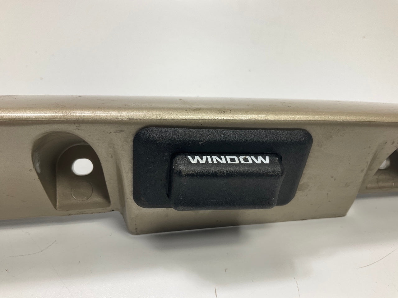 USED - 55155134AD Lift Gate License Plate Trim Champagne 99-04 Grand Cheroke