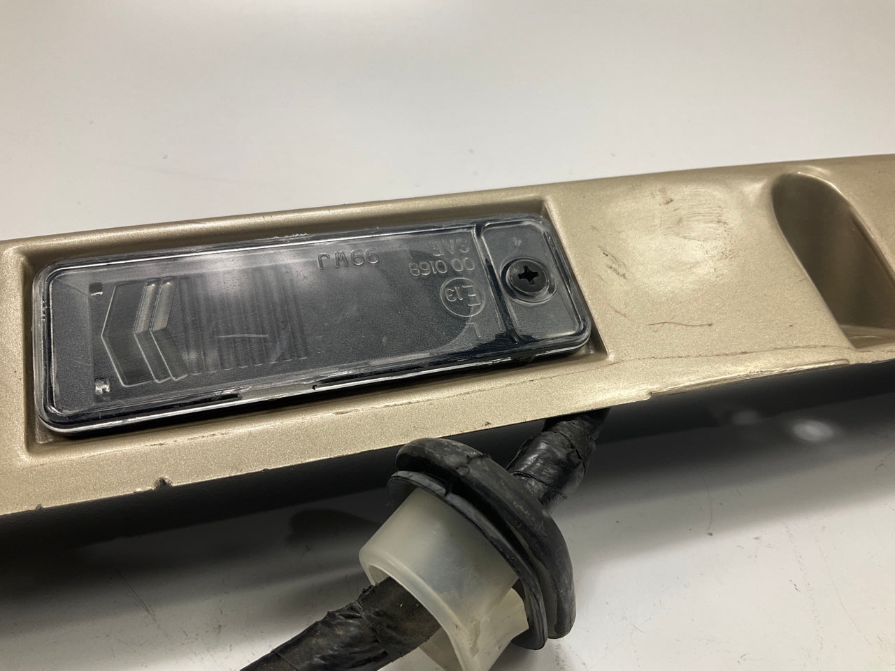 USED - 55155134AD Lift Gate License Plate Trim Champagne 99-04 Grand Cheroke