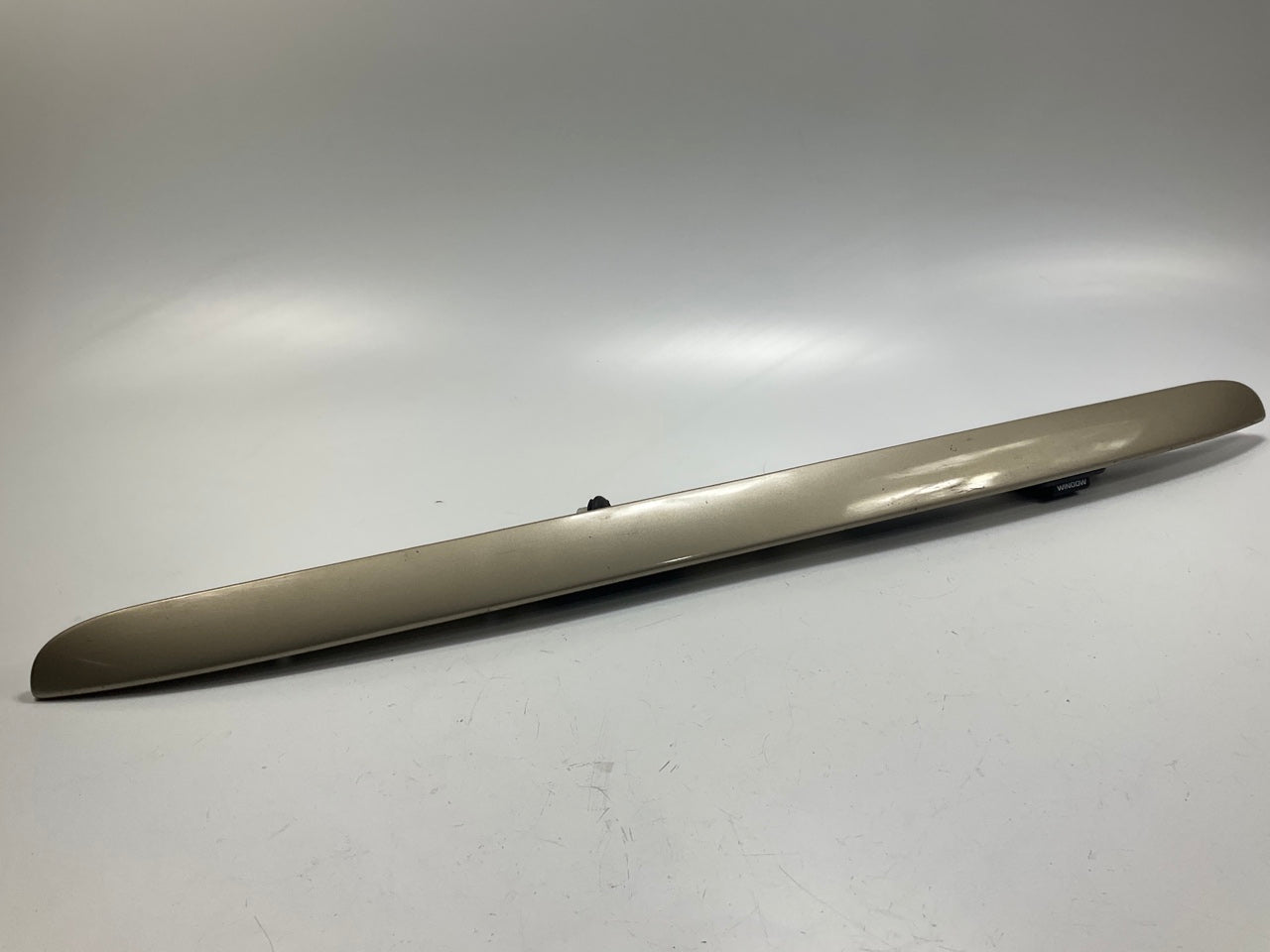 USED - 55155134AD Lift Gate License Plate Trim Champagne 99-04 Grand Cheroke