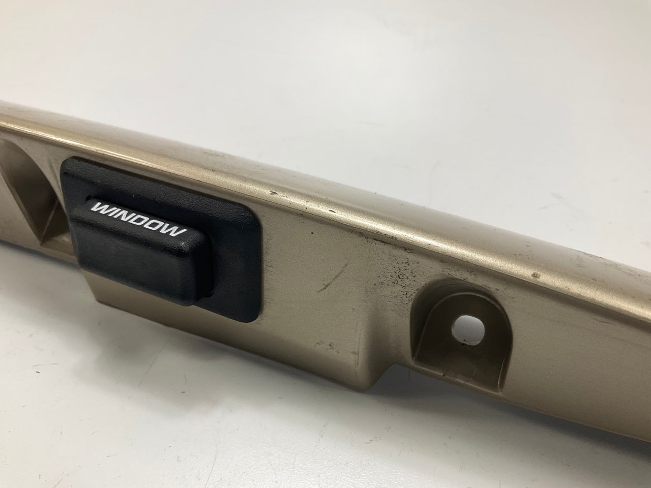 USED - 55155134AD Lift Gate License Plate Trim Champagne 99-04 Grand Cheroke