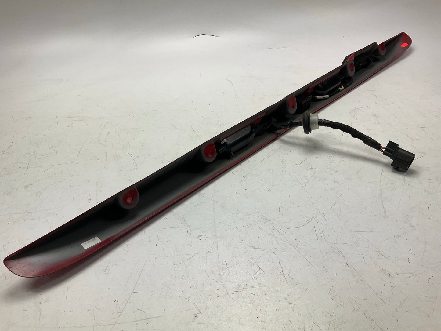 USED SCRATCHED - License Plate Lamp Light Trim Flame Red 99-04 Grand Cherokee