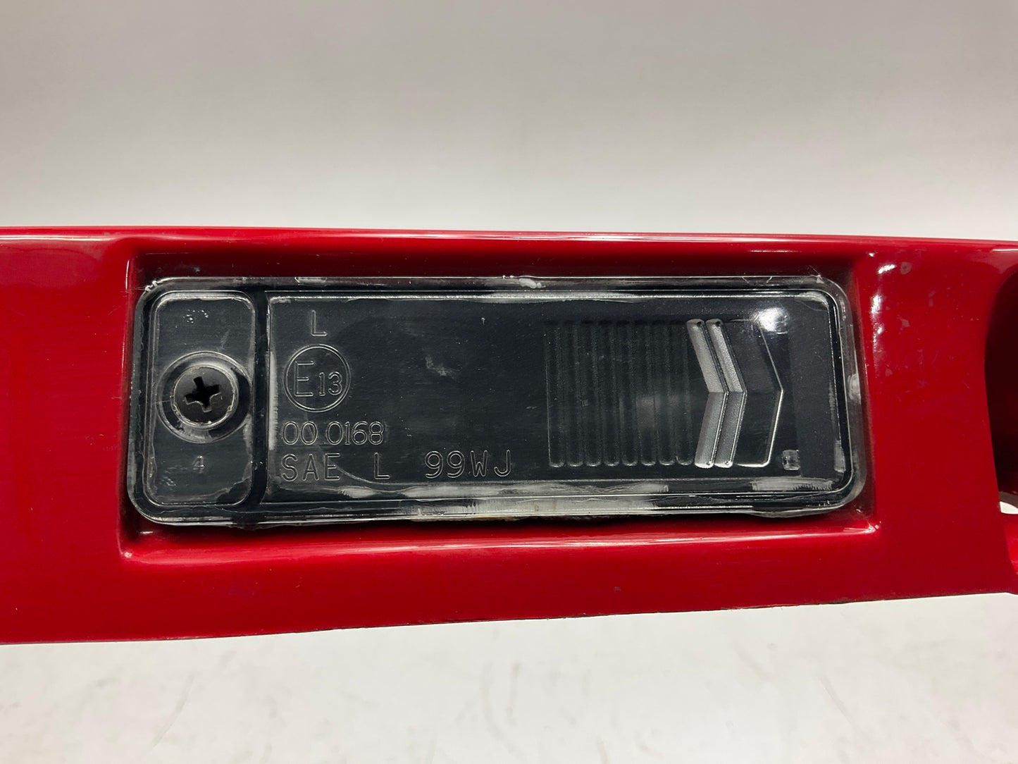 USED SCRATCHED - License Plate Lamp Light Trim Flame Red 99-04 Grand Cherokee