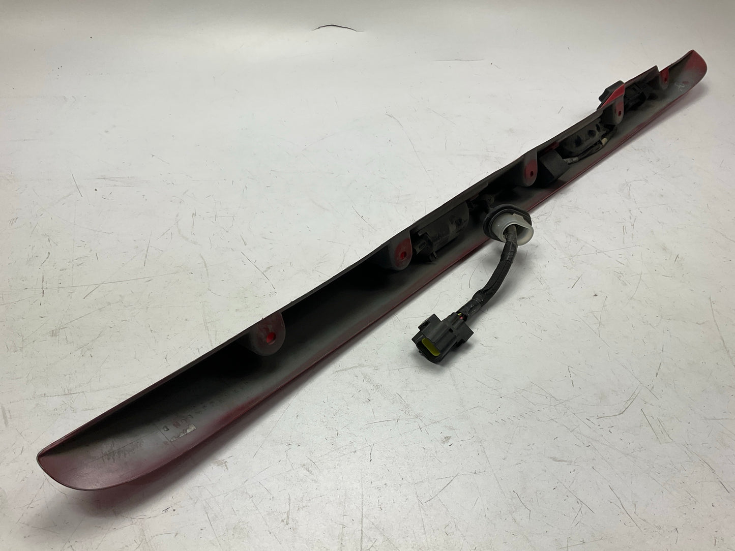 USED SCRATCHED - License Plate Lamp Light Trim Flame Red 99-04 Grand Cherokee