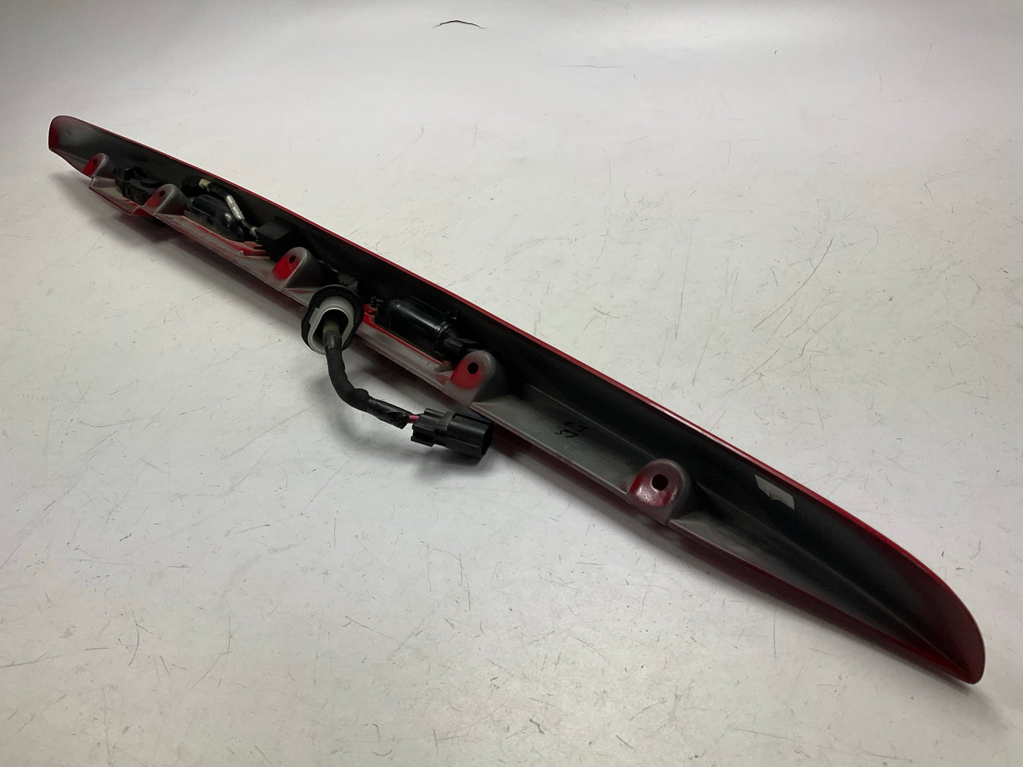 USED SCRATCHED - License Plate Lamp Light Trim Flame Red 99-04 Grand Cherokee