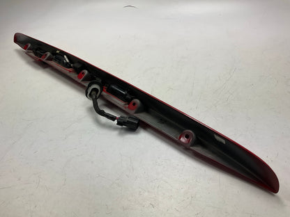 USED SCRATCHED - License Plate Lamp Light Trim Flame Red 99-04 Grand Cherokee