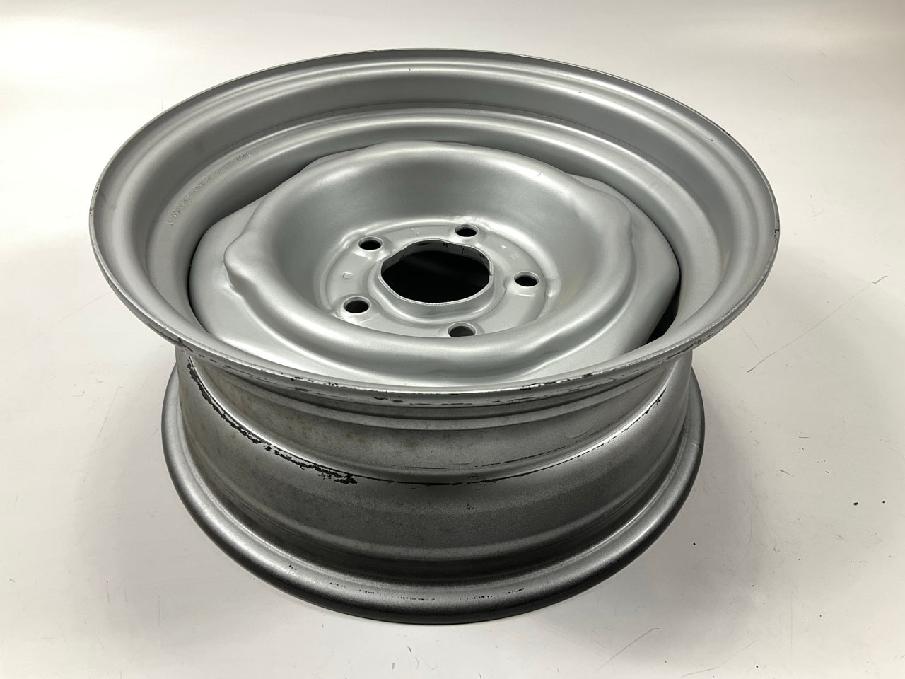 NOS 4-slot Steel Wheel 14''x6'', 5 X 4.5'' PCD 1967-1974 GM Chevy Buick Pontiac